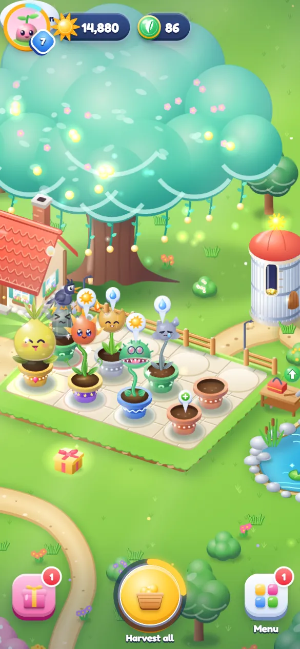 The ranch by day: plants in pots, the house, the silo and the lake